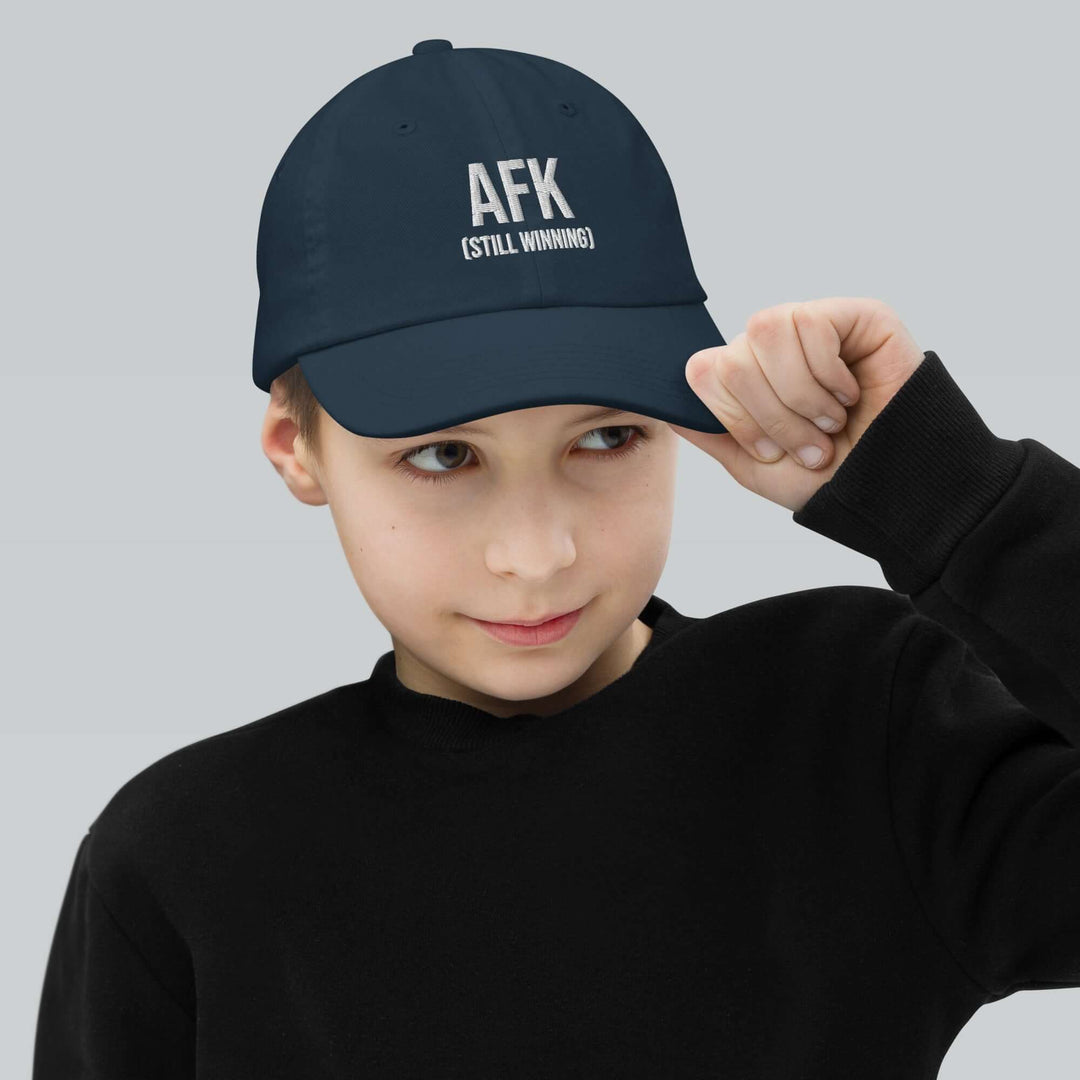 AFK Youth baseball cap worn by a child, ideal for training and play, featuring stylish design and comfortable fit.