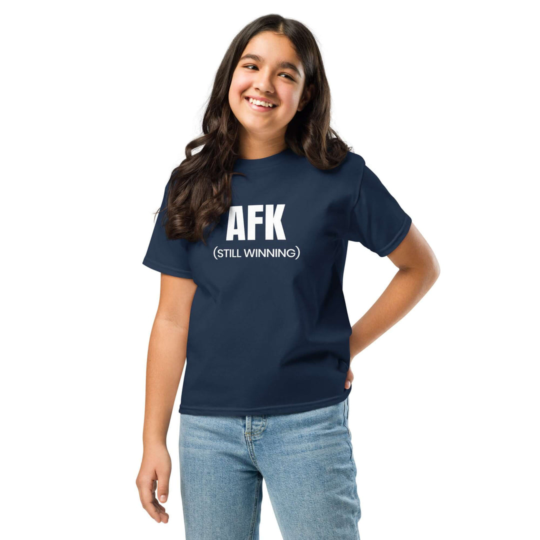 Child wearing AFK Youth classic tee in navy blue with graphic design, offering comfort and style for casual wear.