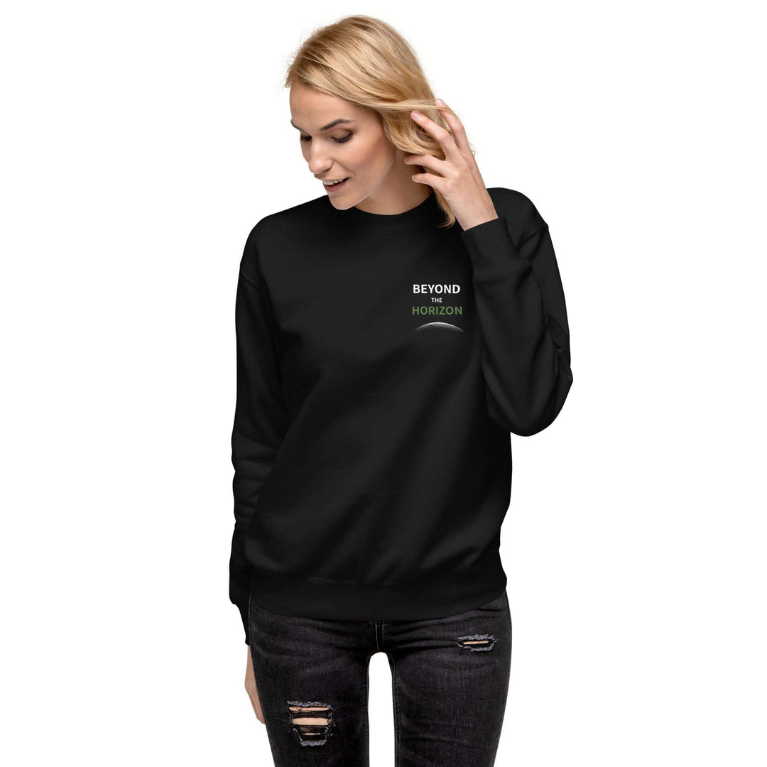 Model wearing Beyond the Horizon Unisex Premium Sweatshirt in black, showcasing style and comfort.