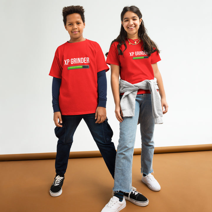 XP Grinder Youth classic tee worn by kids, showcasing comfort and style in a vibrant red color.